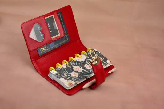 Red travel Happy planner wallet with multiple card slots and a notebook holder